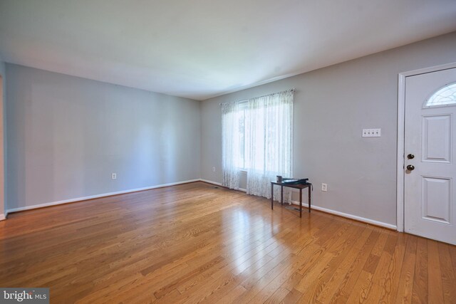 12805 Poplar St, Silver Spring, MD 20904 - foyer entrance with light wood-style floors and baseboards