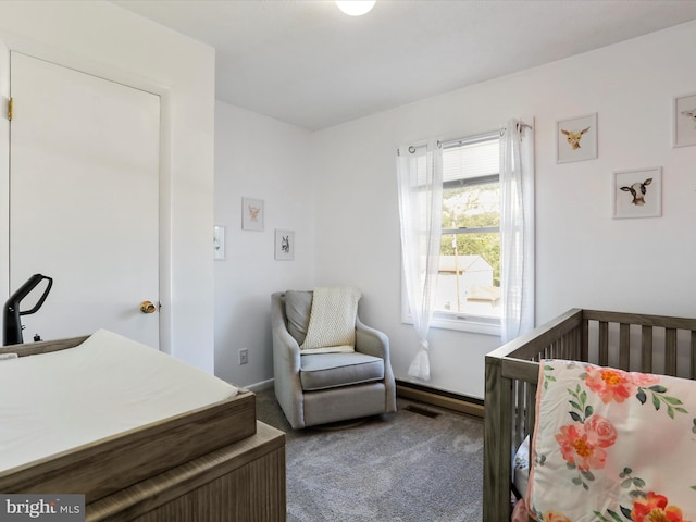 674 Harrison Ave, Berkeley Springs, WV 25411 - carpeted bedroom featuring a crib and baseboards
