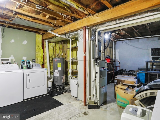 674 Harrison Ave, Berkeley Springs, WV 25411 - unfinished basement with water heater, washing machine and clothes dryer, and concrete block wall