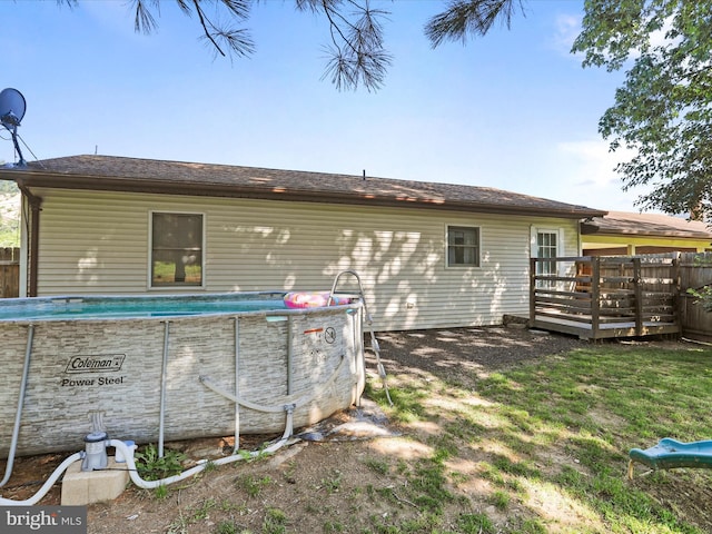 674 Harrison Ave, Berkeley Springs, WV 25411 - rear view of house with a wooden deck