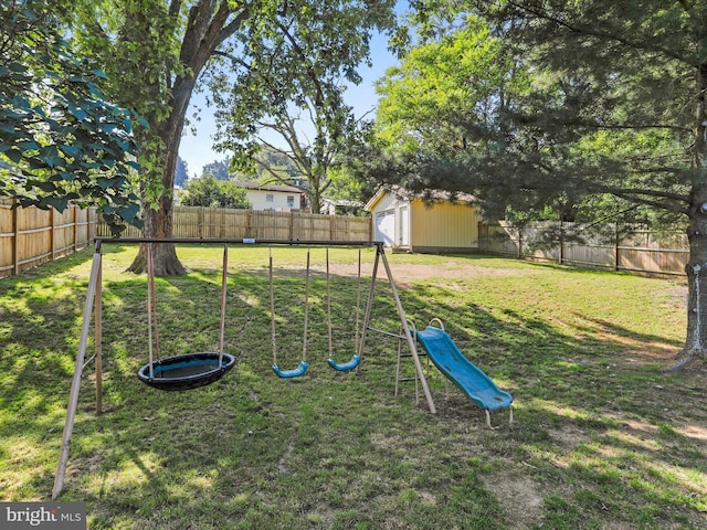 674 Harrison Ave, Berkeley Springs, WV 25411 - view of play area with a fenced backyard and a shed