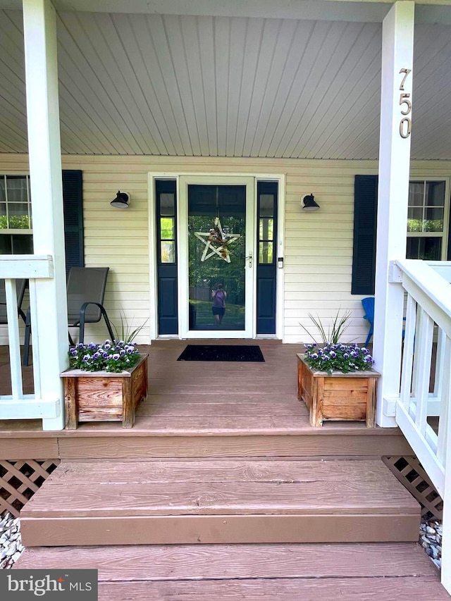 750 Ox Bow Ln, Lusby, MD 20657 - doorway to property with a porch