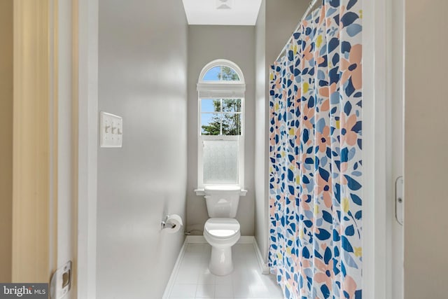 8213 Bearhurst Dr, Gainesville, VA 20155 - full bath featuring tile patterned floors and a shower with shower curtain