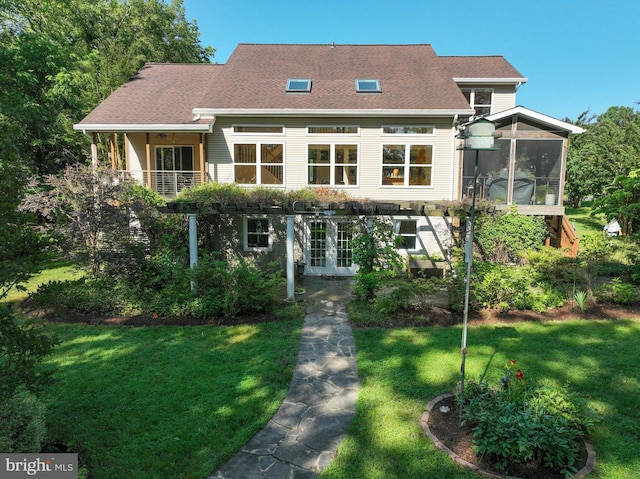 4119 Waterview Dr, Edgewater, MD 21037 - view of front of house with a front lawn, french doors, and a sunroom