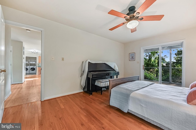 4119 Waterview Dr, Edgewater, MD 21037 - bedroom featuring washing machine and clothes dryer, light wood-style floors, and ceiling fan