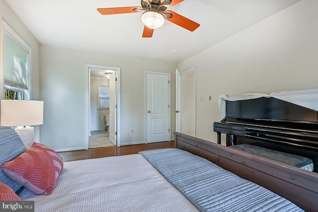 4119 Waterview Dr, Edgewater, MD 21037 - bedroom with wood finished floors, ceiling fan, and ensuite bathroom