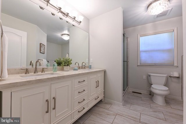 4119 Waterview Dr, Edgewater, MD 21037 - bathroom with double vanity, a shower with shower door, and marble finish floors