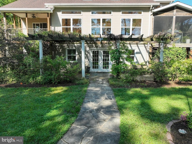 4119 Waterview Dr, Edgewater, MD 21037 - view of front of house with french doors, a pergola, a front lawn, and ceiling fan