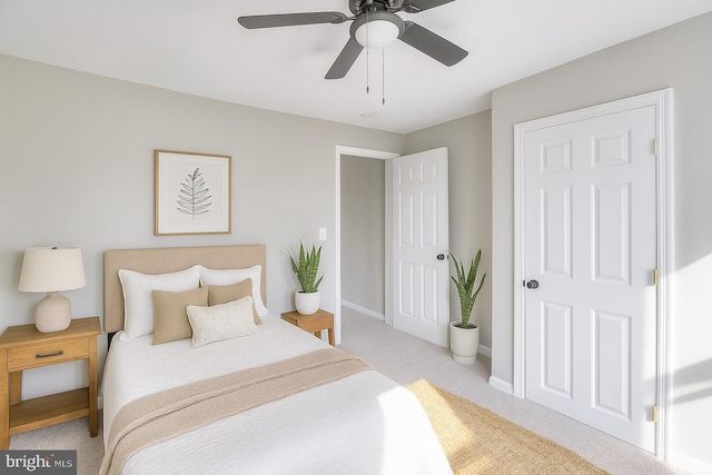 429 N Lakewood Ave, Baltimore, MD 21224 - carpeted bedroom featuring baseboards and ceiling fan