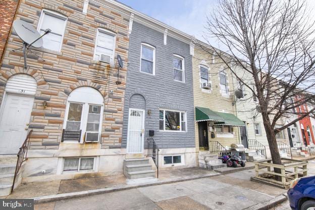429 N Lakewood Ave, Baltimore, MD 21224 - view of property featuring entry steps and stone siding