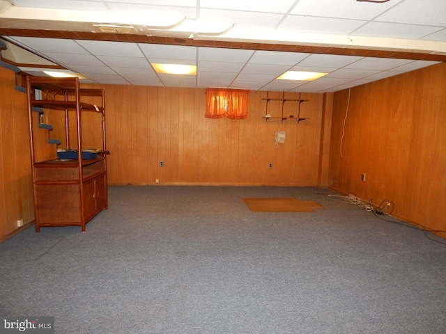 5809 Eurith Ave, Baltimore, MD 21206 - finished basement featuring wooden walls, a paneled ceiling, and carpet flooring