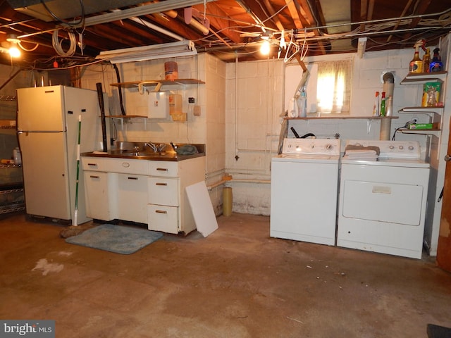 5809 Eurith Ave, Baltimore, MD 21206 - below grade area featuring freestanding refrigerator and washer and clothes dryer