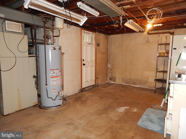 5809 Eurith Ave, Baltimore, MD 21206 - unfinished basement featuring gas water heater