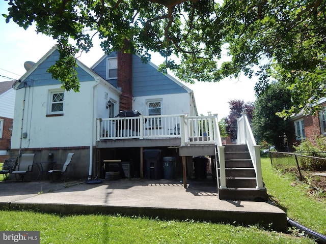 5809 Eurith Ave, Baltimore, MD 21206 - rear view of property with a patio area, a wooden deck, and stairway