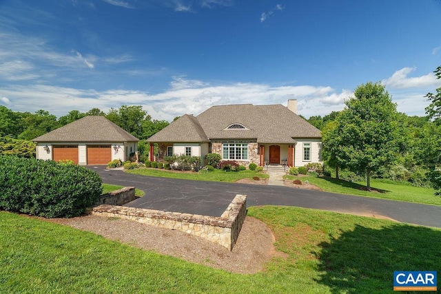 3525 Rocks Mill Ln, Charlottesville, VA 22903 - view of front facade featuring a chimney, a garage, a front lawn, and stone siding