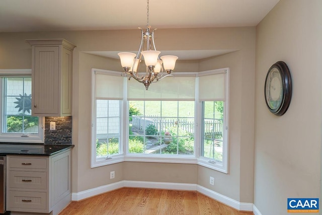 3525 Rocks Mill Ln, Charlottesville, VA 22903 - unfurnished dining area featuring a chandelier, plenty of natural light, and light wood-style flooring