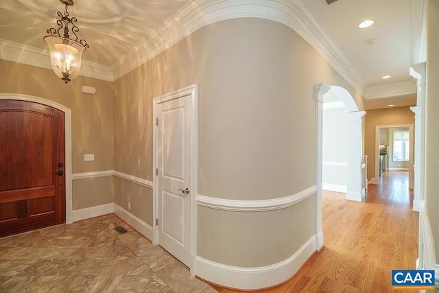 3525 Rocks Mill Ln, Charlottesville, VA 22903 - entrance foyer with arched walkways, ornamental molding, ornate columns, and recessed lighting