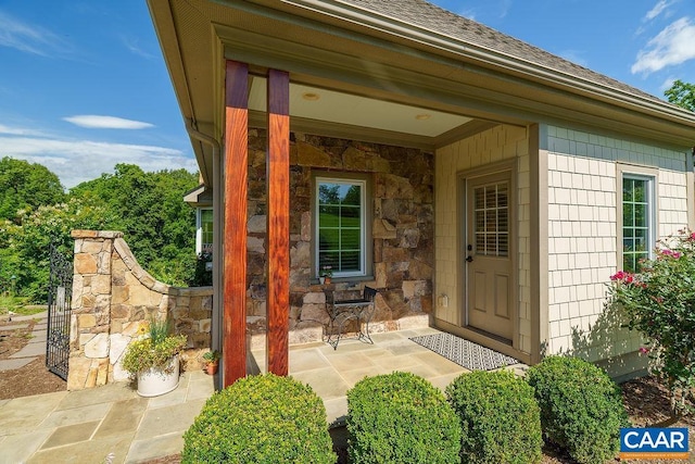 3525 Rocks Mill Ln, Charlottesville, VA 22903 - entrance to property featuring roof with shingles and stone siding