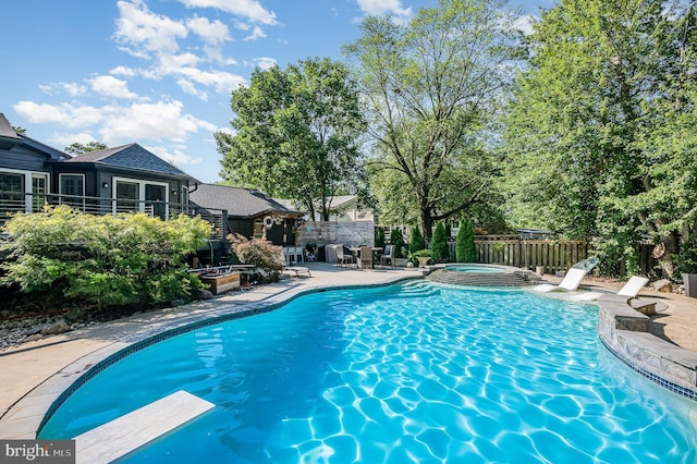 9016 Greylock St, Alexandria, VA 22308 - view of swimming pool with an in-ground hot tub, a patio, and a diving board