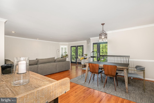 9016 Greylock St, Alexandria, VA 22308 - dining area with wood finished floors, crown molding, and recessed lighting