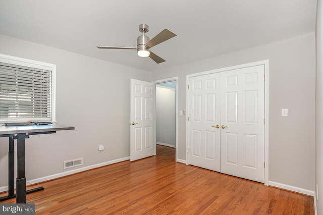 9016 Greylock St, Alexandria, VA 22308 - unfurnished bedroom with light wood-type flooring, a closet, and ceiling fan