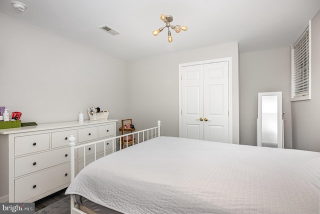 9016 Greylock St, Alexandria, VA 22308 - bedroom with dark wood-style floors and a closet