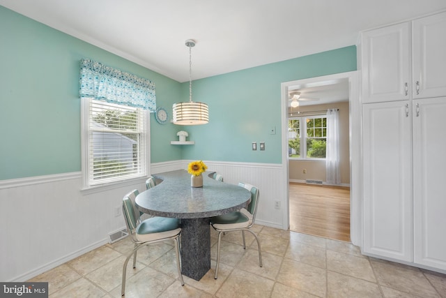 510 Revere Ct, Hockessin, DE 19707 - dining room featuring a wainscoted wall and ceiling fan