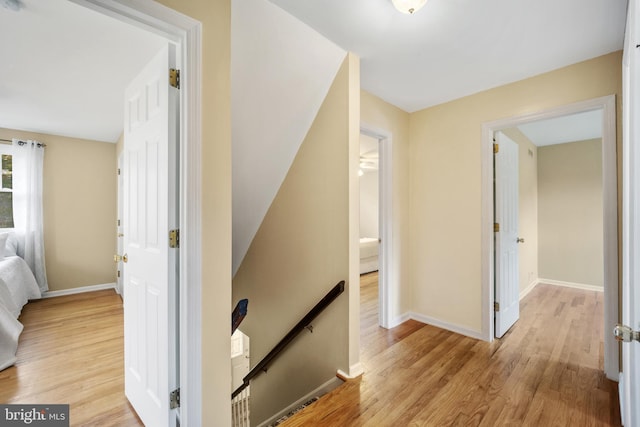 510 Revere Ct, Hockessin, DE 19707 - corridor with an upstairs landing and light wood-type flooring