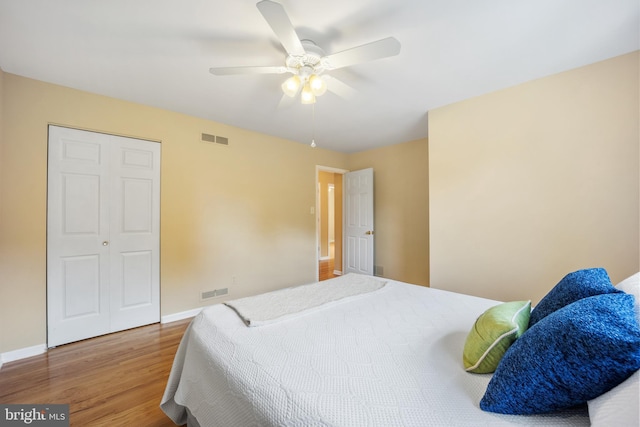 510 Revere Ct, Hockessin, DE 19707 - bedroom with wood finished floors, ceiling fan, and a closet