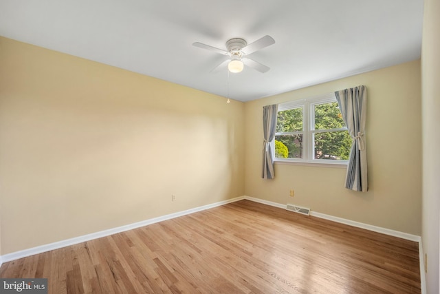 510 Revere Ct, Hockessin, DE 19707 - empty room with ceiling fan and light wood-style flooring