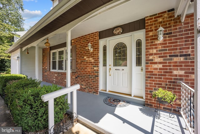 510 Revere Ct, Hockessin, DE 19707 - property entrance with brick siding and covered porch