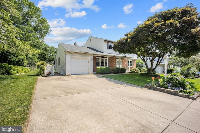 510 Revere Ct, Hockessin, DE 19707 - traditional home with an attached garage, a front yard, driveway, and brick siding