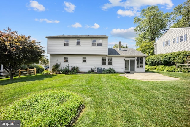 510 Revere Ct, Hockessin, DE 19707 - rear view of house featuring a patio area and a chimney