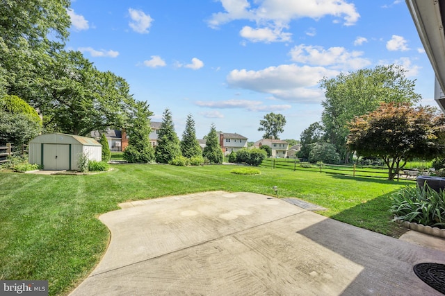 510 Revere Ct, Hockessin, DE 19707 - view of yard featuring a patio area, a storage unit, and a residential view