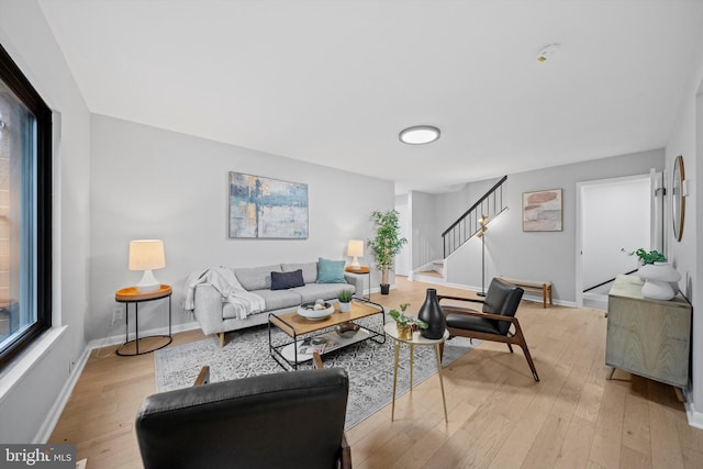 3114 Berry Rd NE Unit 21, Washington, DC 20018 - living area featuring stairs and light wood-style flooring