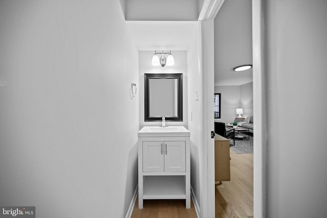 3114 Berry Rd NE Unit 21, Washington, DC 20018 - hall with wood finished floors and a chandelier