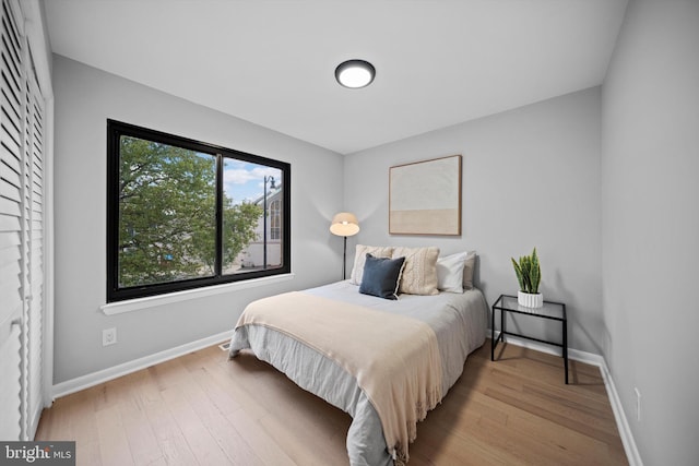 3114 Berry Rd NE Unit 21, Washington, DC 20018 - bedroom featuring baseboards and wood finished floors