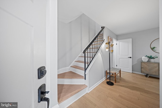 3114 Berry Rd NE Unit 21, Washington, DC 20018 - staircase featuring wood finished floors and baseboards