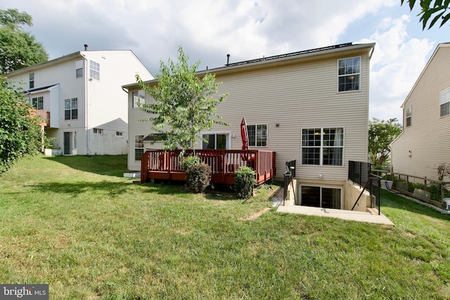 14813 Blackburn Rd, Burtonsville, MD 20866 - rear view of house featuring a wooden deck and a lawn