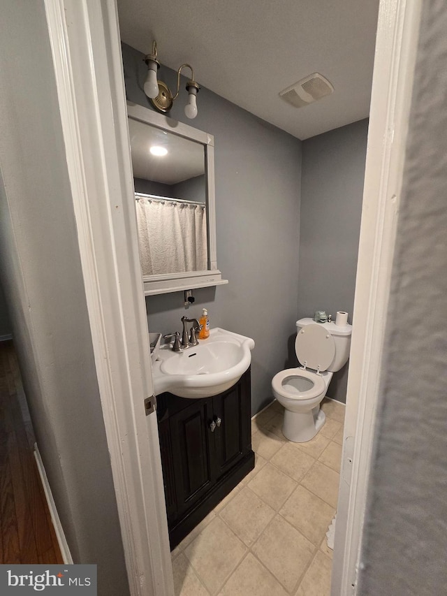 214 Dennison St, Colonial Beach, VA 22443 - full bathroom featuring vanity and tile patterned floors