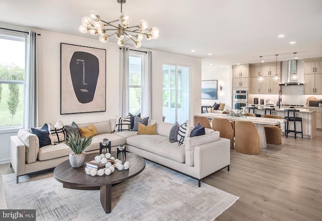 LOT29-109 Tiffany Ln, Spring City, PA 19475 - living room with plenty of natural light, light wood-style floors, a chandelier, and recessed lighting