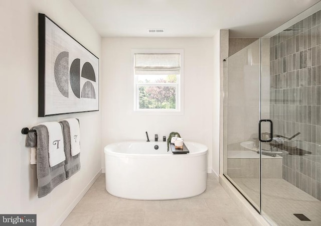 LOT29-109 Tiffany Ln, Spring City, PA 19475 - full bathroom featuring a stall shower, a freestanding tub, and tile patterned flooring