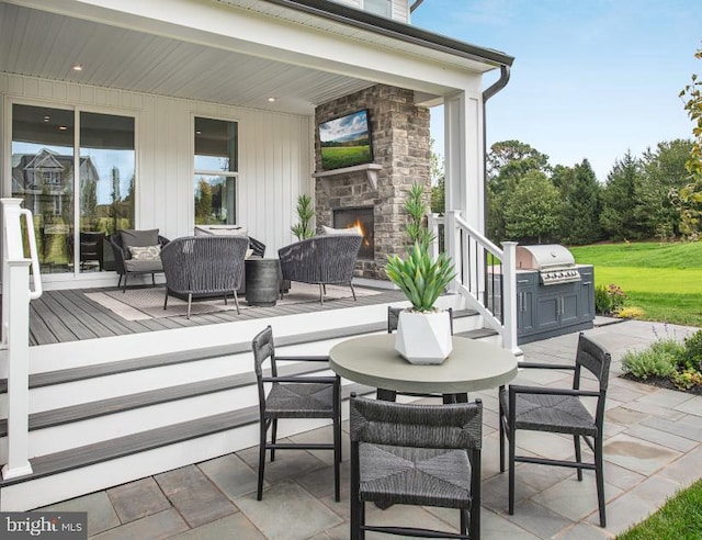 LOT29-109 Tiffany Ln, Spring City, PA 19475 - view of patio featuring an outdoor stone fireplace, grilling area, and a wooden deck
