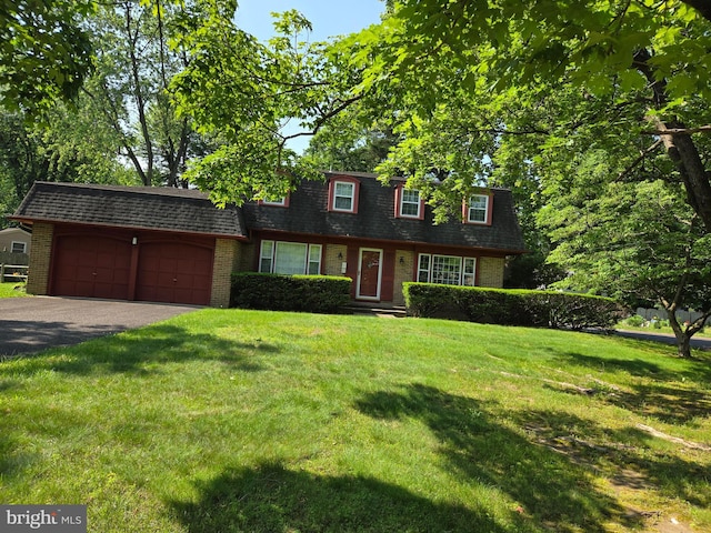 100 E Eagle Ln, Cherry Hill, NJ 08003 - view of front of house with mansard roof, brick siding, and an attached garage