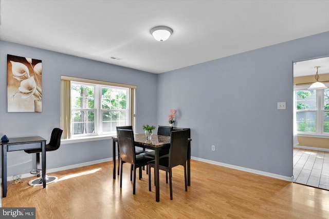 26 Millbank Ln, Voorhees, NJ 08043 - dining room with light wood finished floors and baseboards