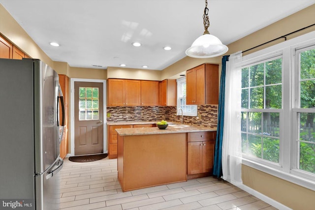 26 Millbank Ln, Voorhees, NJ 08043 - kitchen with freestanding refrigerator, tasteful backsplash, healthy amount of natural light, and recessed lighting