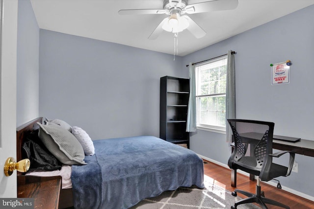 26 Millbank Ln, Voorhees, NJ 08043 - bedroom with wood finished floors, a desk, and a ceiling fan