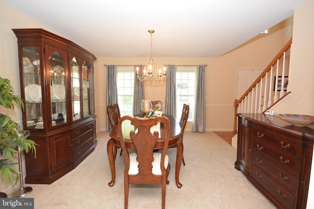 321 Coventry Ln, Lititz, PA 17543 - dining area with a chandelier, stairway, and light colored carpet