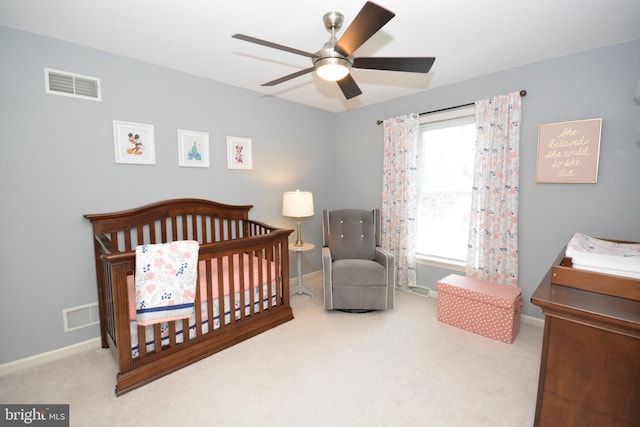 321 Coventry Ln, Lititz, PA 17543 - carpeted bedroom featuring a crib and ceiling fan