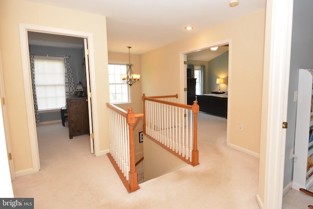 321 Coventry Ln, Lititz, PA 17543 - hallway featuring an upstairs landing, a chandelier, and carpet flooring